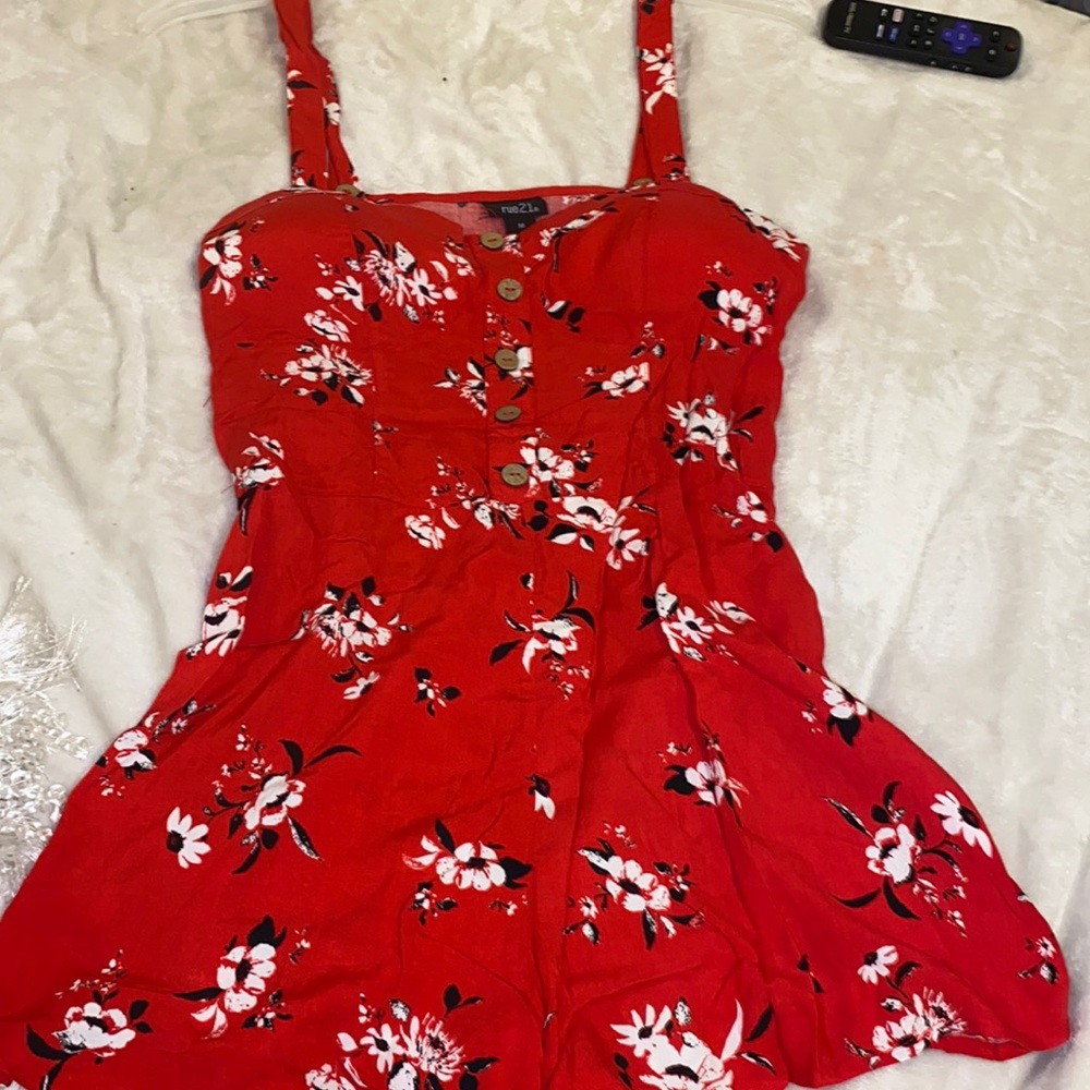 Bright red romper with flowers
